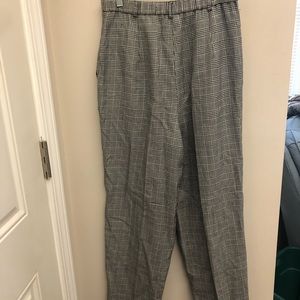 Slim leg trousers. Black and white. 90s era.